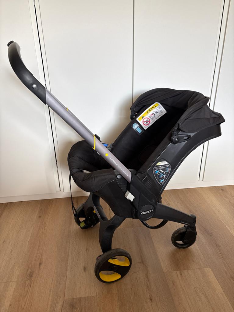 Doona+ autostoel en kinderwagen in één + muggennet, Kinderen en Baby's, Autostoeltjes, Autogordel, 0 t/m 18 kg, Zijbescherming