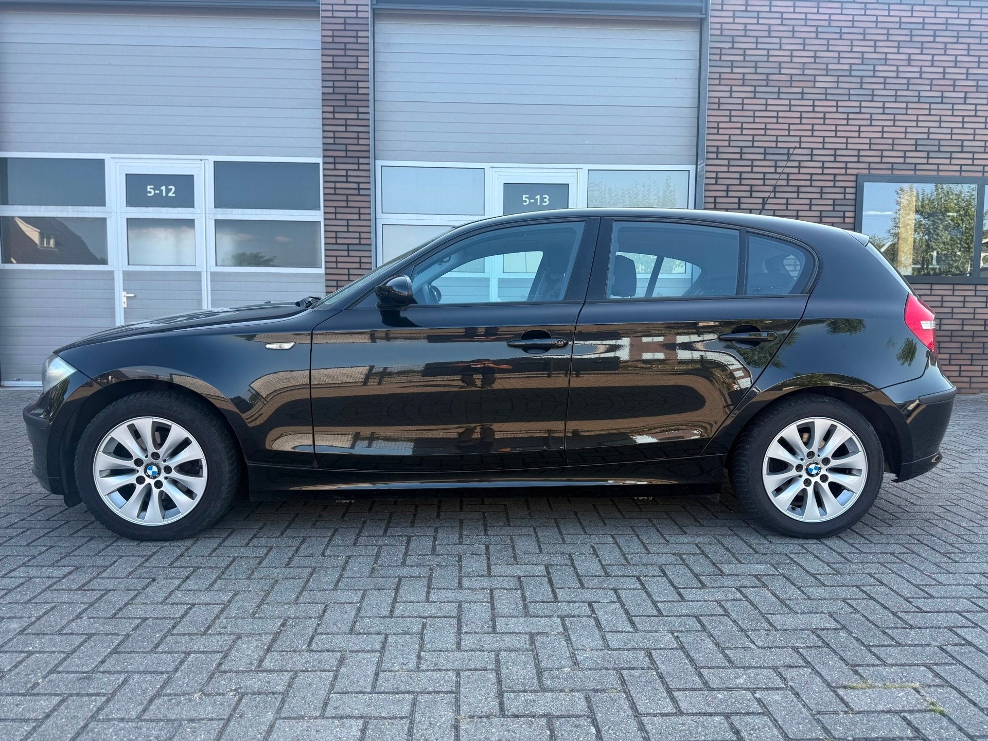 BMW 1-serie 116i Business Line Airco Cruise Elekpakket Nap, Auto's, BMW, 1-Serie, Achterwielaandrijving, 4 cilinders, 4 stoelen
