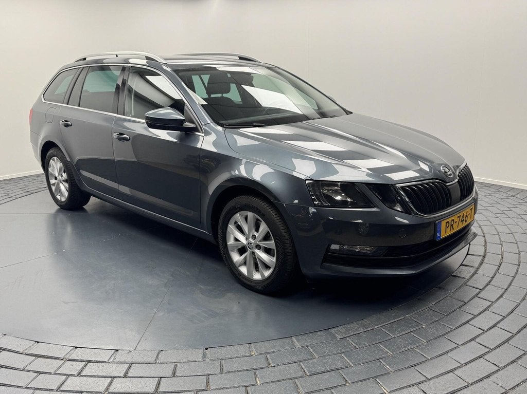 Skoda Octavia Combi 1.0 TSi Greentech Automaat-Trekhaak-Navi, Auto's, Stof, Met garantie (alle), 116 pk, Origineel Nederlands