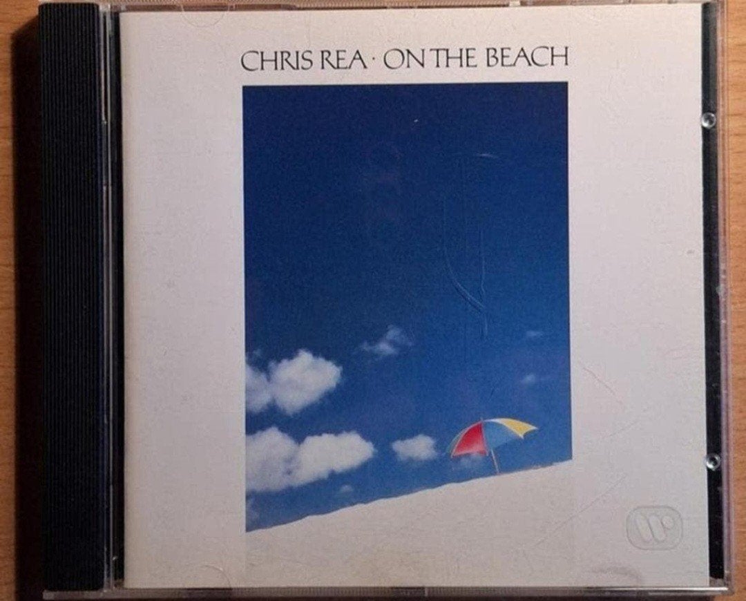Chris Rea - On The Beach CD (in prima staat), Inclusief boekje, Pop, Ophalen of Verzenden, Zo goed als nieuw