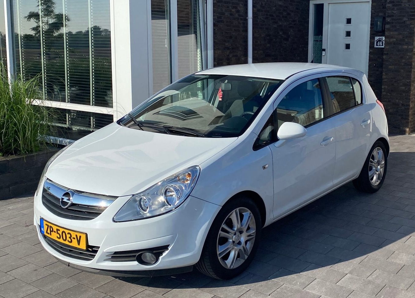 Opel Corsa 1.4 16V 5D AUT 2009 Wit 115.000km, Auto's, 15 km/l, 4 cilinders, 1088 kg, 1364 cc