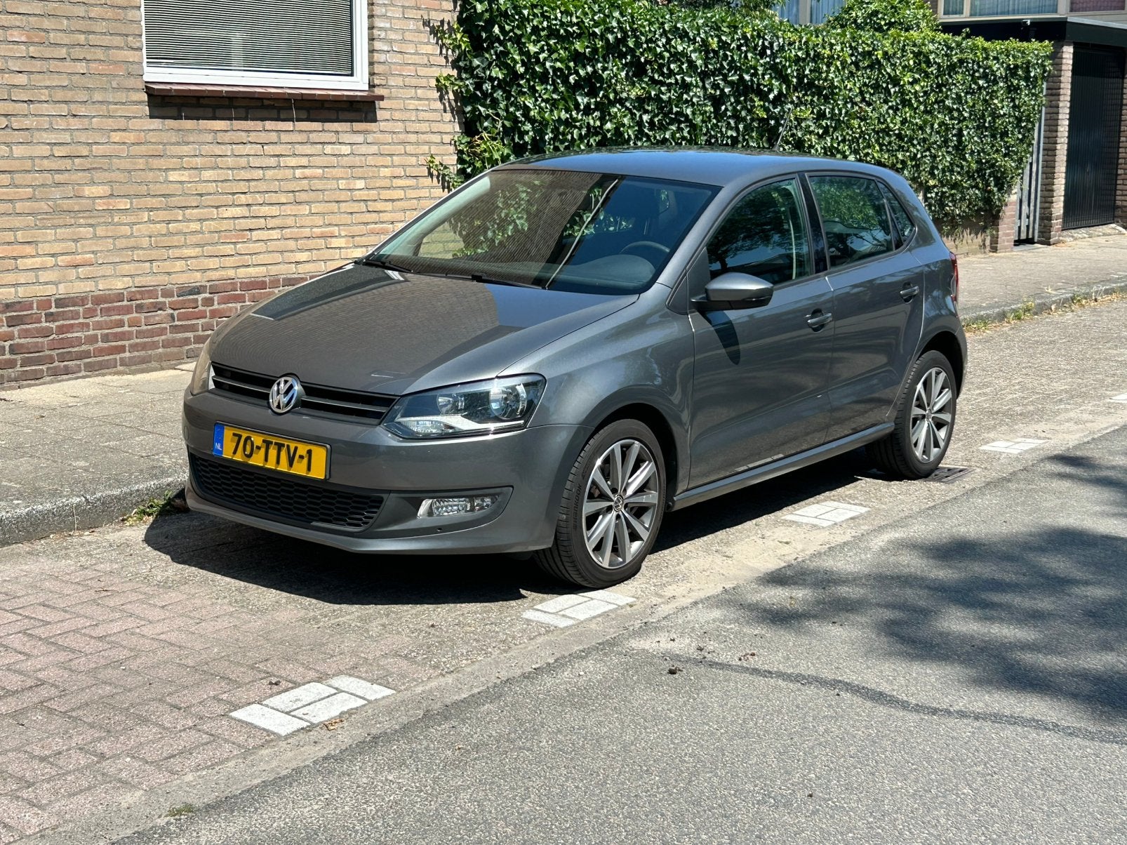 Volkswagen Polo 1.2 TSI 77KW 2012 Grijs, Auto's, Voorwielaandrijving, 40 €/maand, 1200 kg, Handgeschakeld