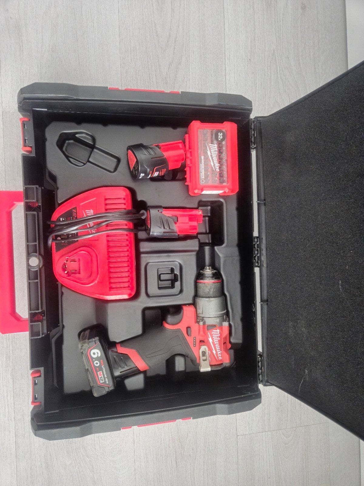 Milwaukee M12 FPD2 + bitset en 3 accu's!, Ophalen of Verzenden, Zo goed als nieuw, Boor- en Schroefmachine
