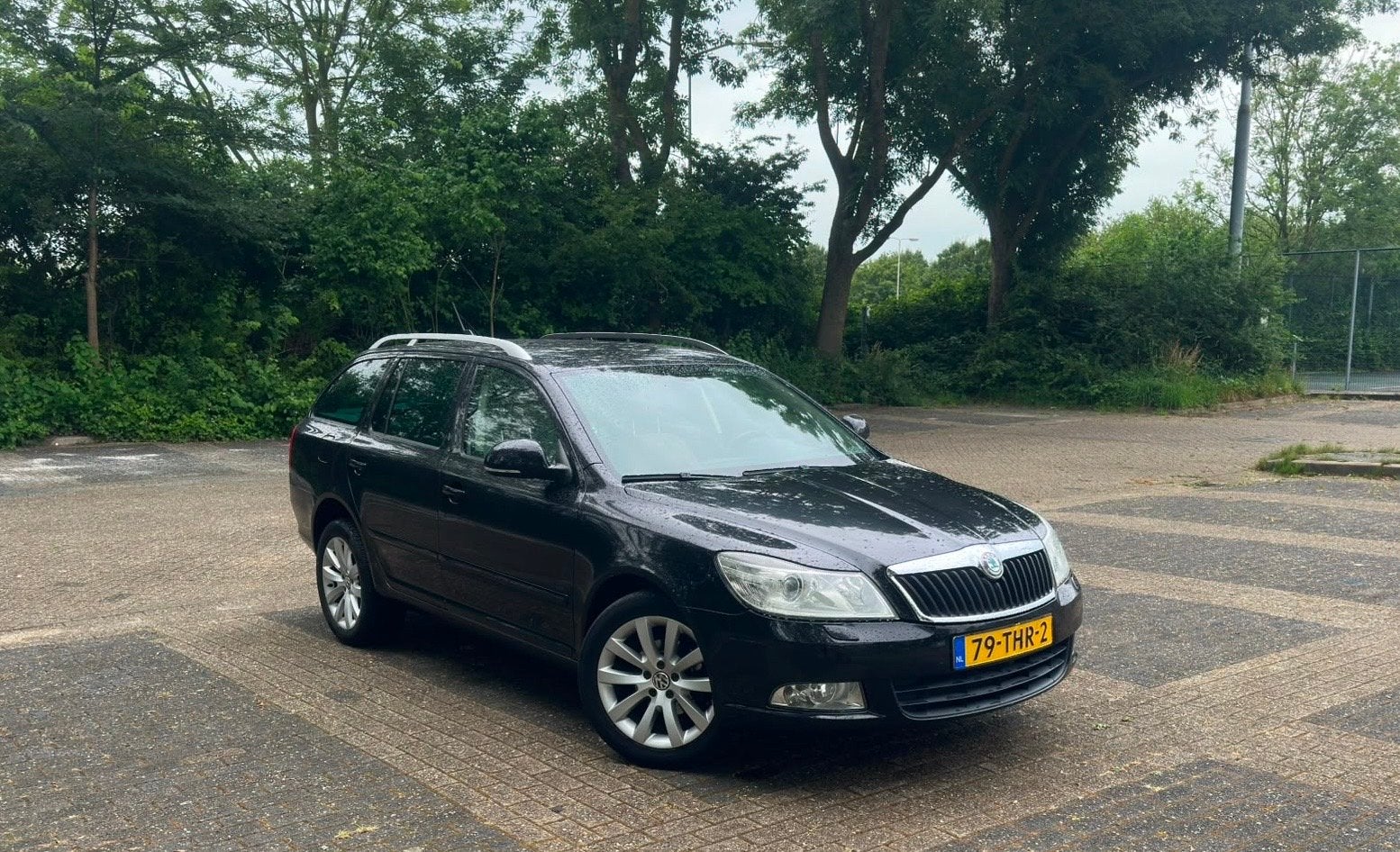 Skoda Octavia 1.2 TSI Combi 2012 Zwart, Auto's, Skoda, Voorwielaandrijving, 4 cilinders, Zwart, Origineel Nederlands