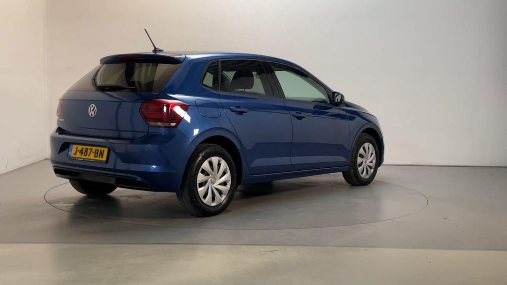 Volkswagen Polo 1.0 TSI Comfortline Parkeersensoren Navigati, Auto's, Voorwielaandrijving, Stof, Gebruikt, 95 pk