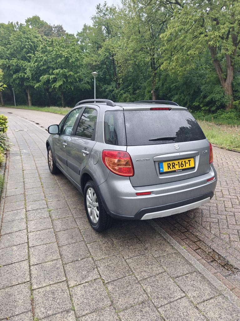 Suzuki SX4 1.6 AUTOMAAT 2012 - 58dkm, Auto's, Suzuki, Euro 5, 15 km/l, 4 cilinders, 49 €/maand