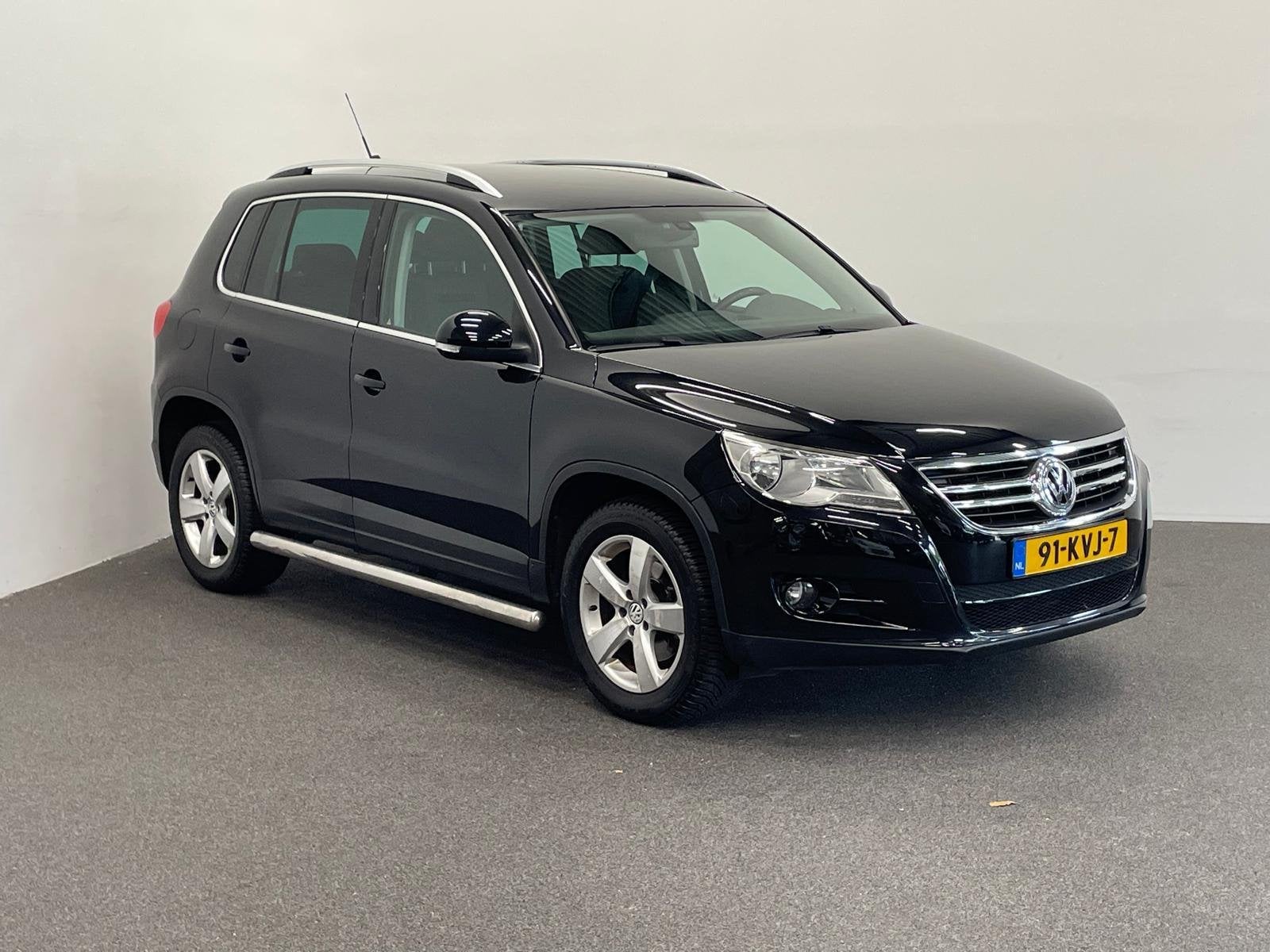 Volkswagen Tiguan 2.0 TDI Trend&Fun 4Motion Trekhaak Navigat, Stof, Gebruikt, Zwart, 4 cilinders