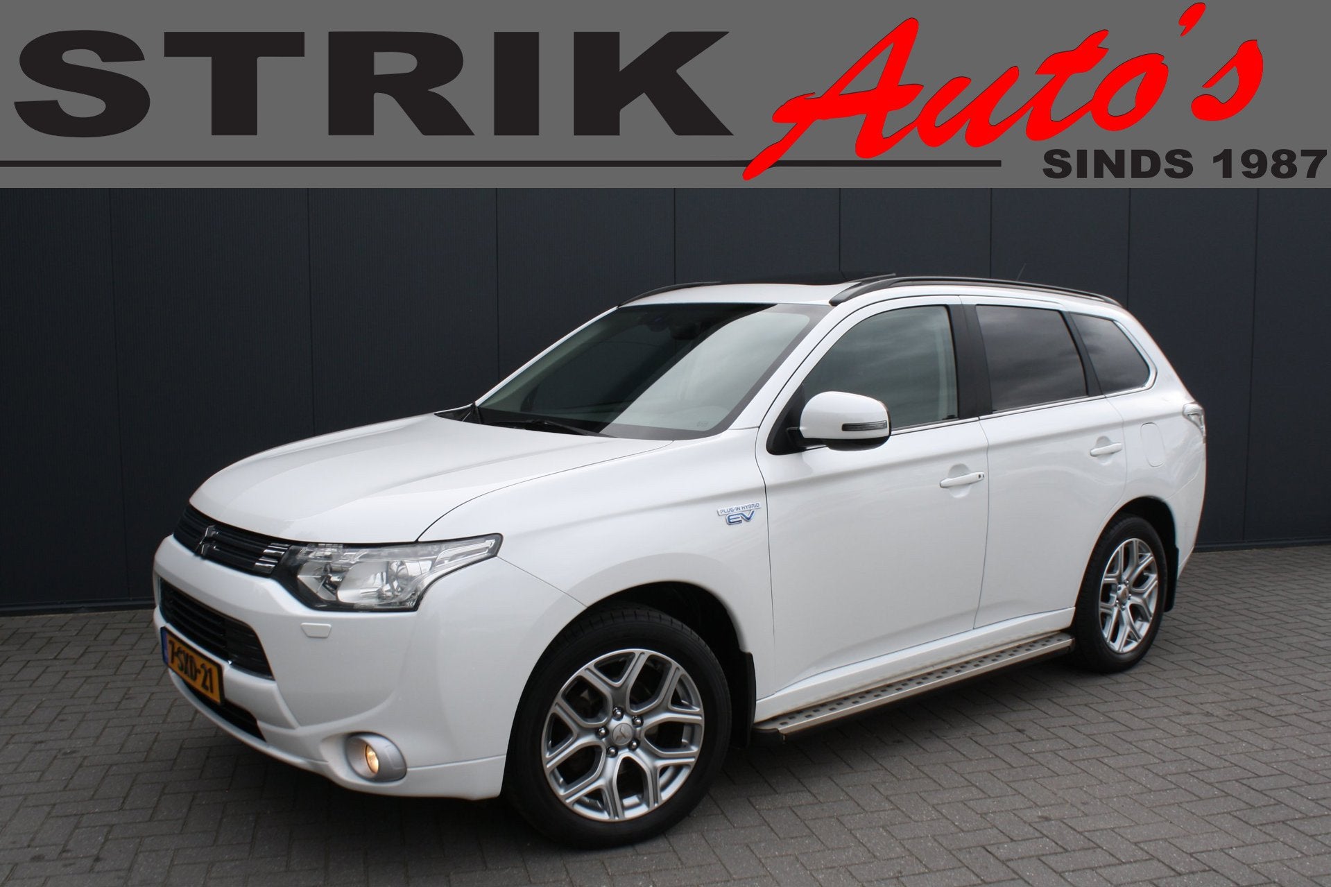 Mitsubishi Outlander 2.0 PHEV instyle - SCHUIFDAK - TREKHAAK, Auto's, Zwart, 4 cilinders, Wit, Vierwielaandrijving