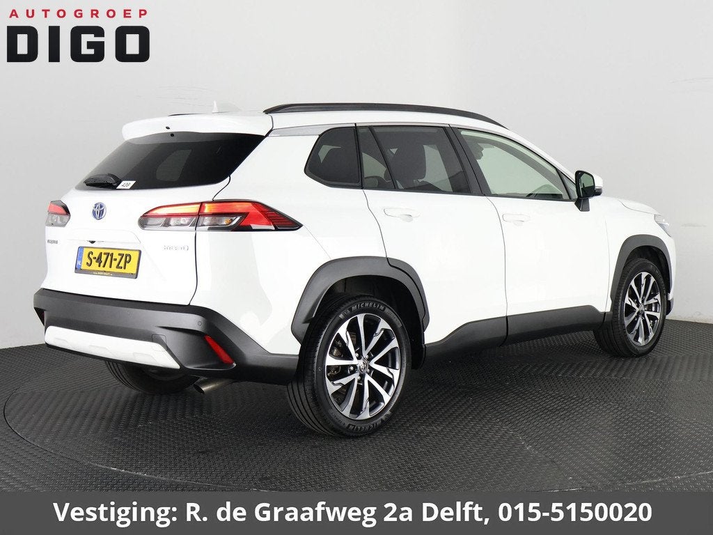 Toyota Corolla Cross 2.0 High Power Hybrid First Edition | S, Auto's, Toyota, Gebruikt, 4 cilinders, Leder en Stof, Wit