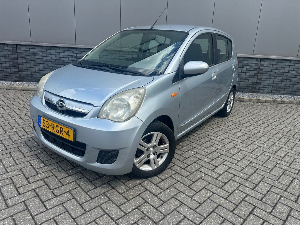 Daihatsu CUORE 1.0i + Airco  km stand Nap, Auto's, Daihatsu, Voorwielaandrijving, 18 €/maand, 4 stoelen, Cuore