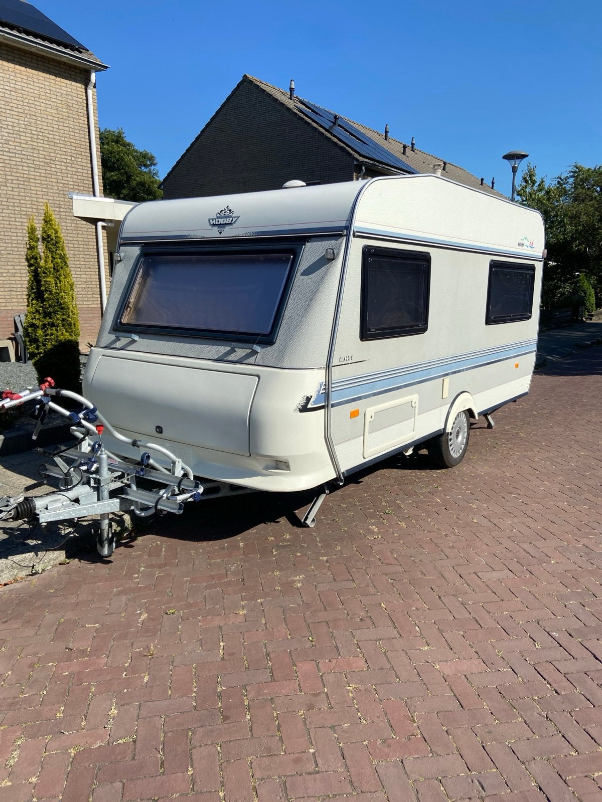 Hobby Classic caravan met nieuwe voortent en fietsenrek, Vast bed, Hobby, Treinzit, Particulier