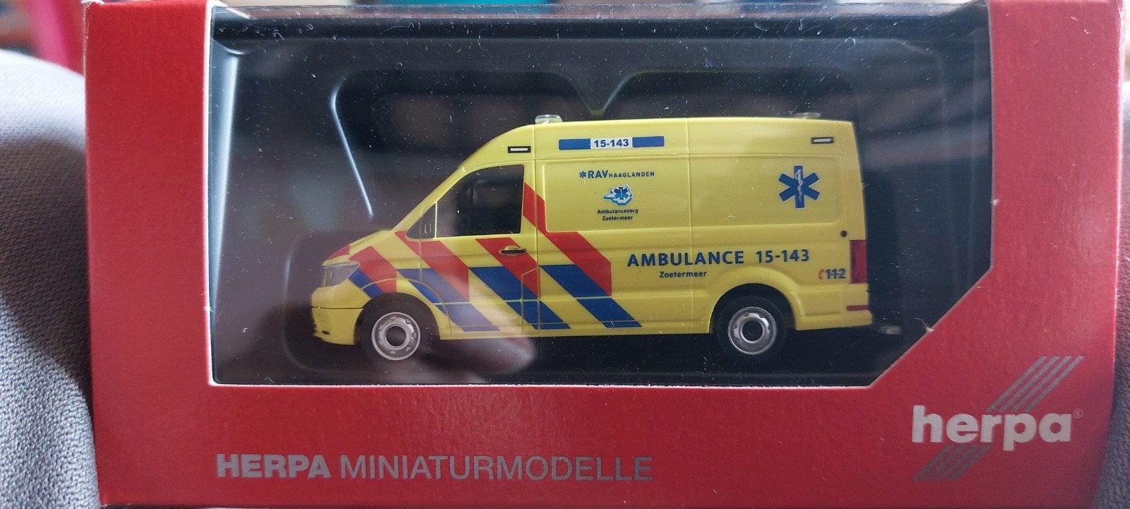 H0LK 0702 MAN TGE AMBULANCE ZOETERMEER 1/87, Ophalen of Verzenden, Nieuw, Bus of Vrachtwagen, Herpa