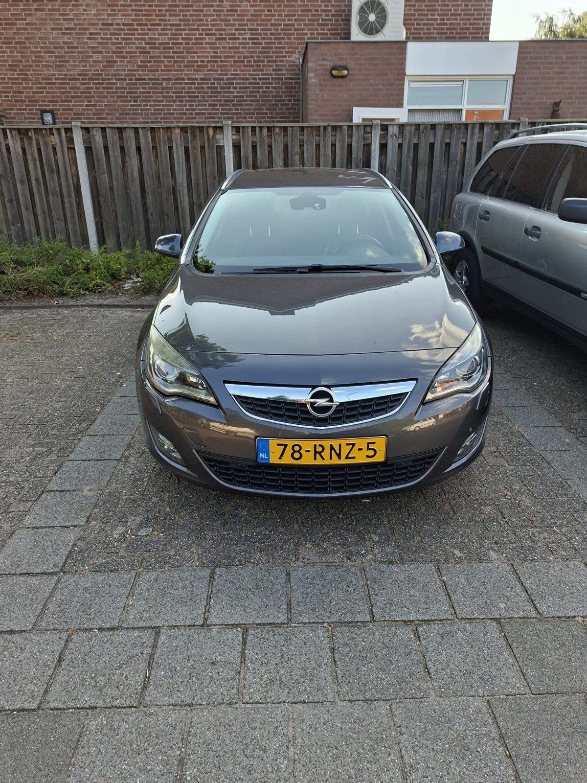 Opel Astra 1.4 Turbo 88KW ST 2011 Grijs, Auto's, Voorwielaandrijving, Zwart, 4 cilinders, Elektronische parkeerrem