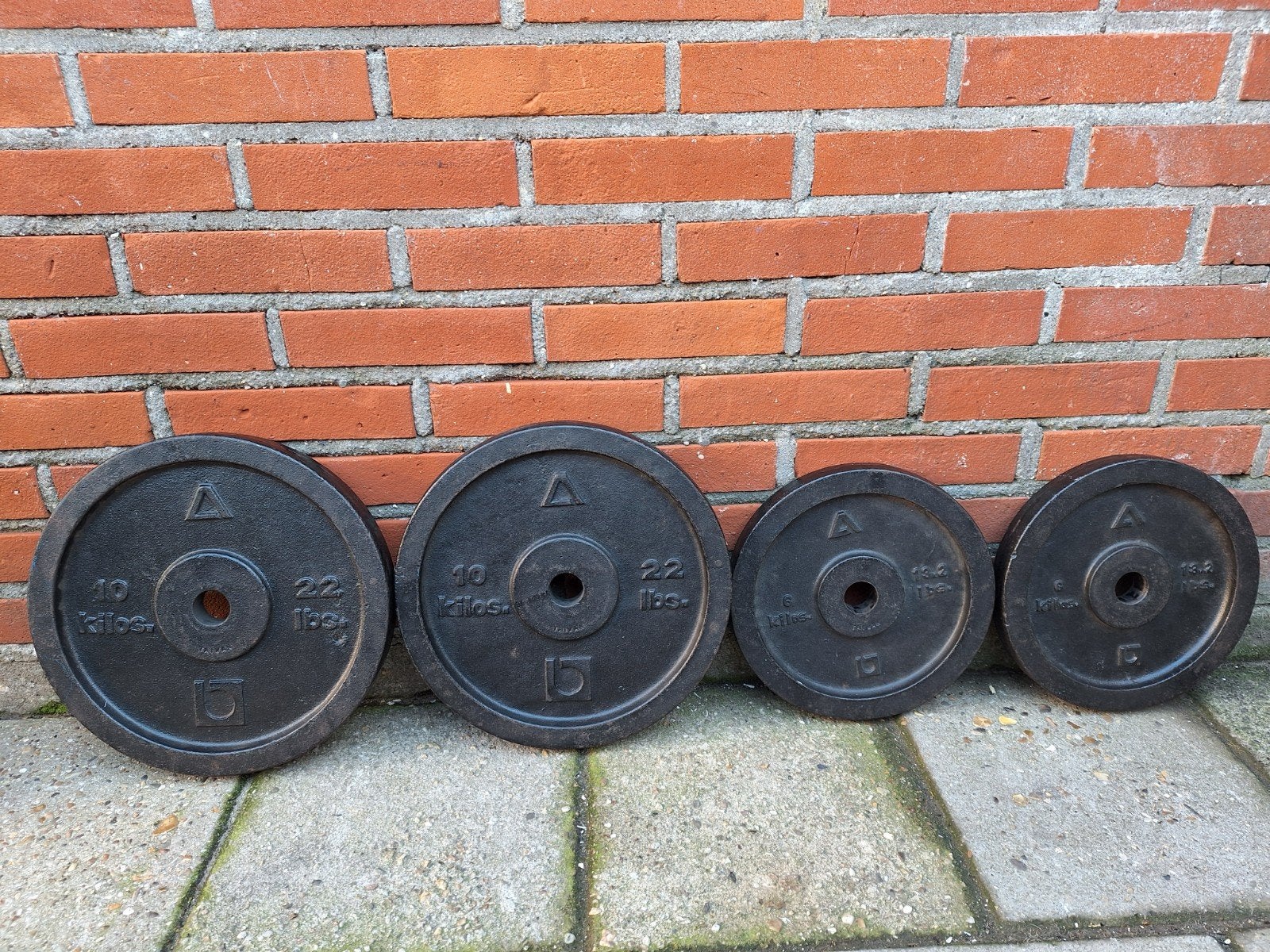 Vintage Gietijzeren Halterschijven  2x10kg en 2x6kg, Ophalen of Verzenden, Gebruikt, Armen, Halterschijven