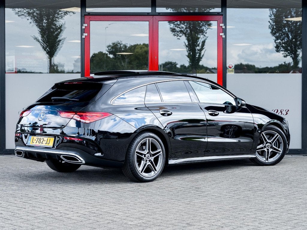 Mercedes-Benz CLA-klasse Shooting Brake 200 AMG | Burmester, Auto's, Mercedes-Benz, 730 kg, Gebruikt, 4 cilinders, Leder en Stof