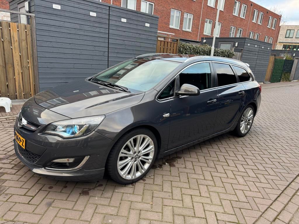 Opel Astra Sports Tourer 1.4 Turbo Sport + OPC Line / Leder, Auto's, Voorwielaandrijving, 4 cilinders, Handgeschakeld, 1364 cc