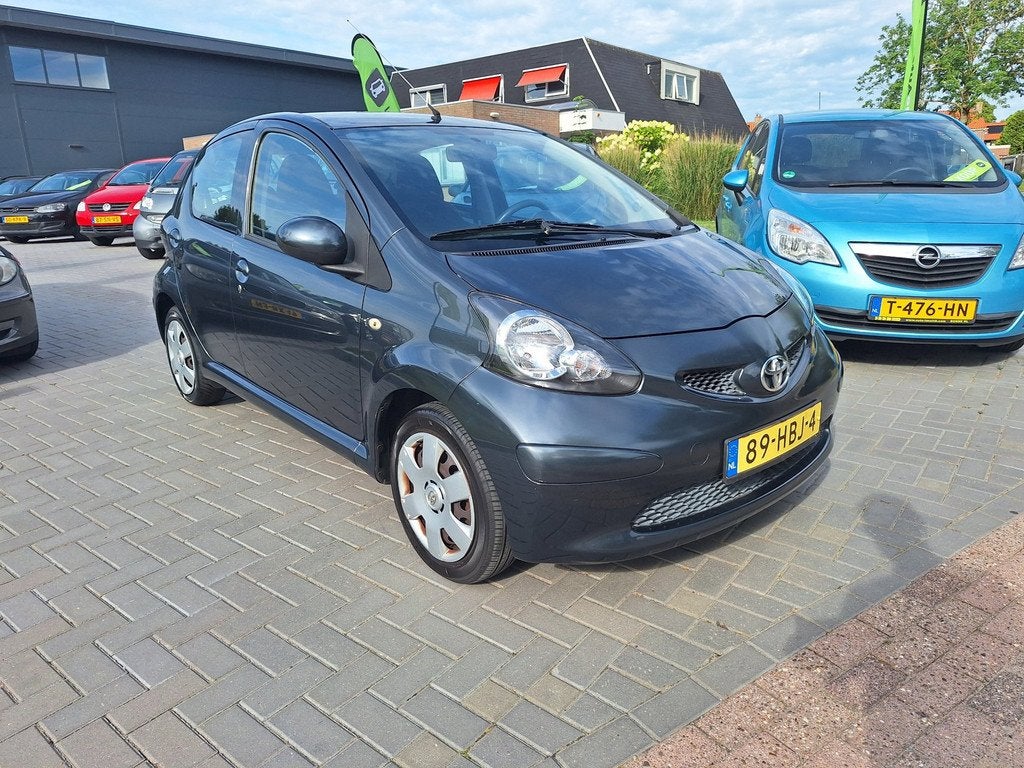 Toyota Aygo 1.0-12V + / 90.315 km NAP / Nieuwe APK bij aflev, Auto's, Voorwielaandrijving, Gebruikt, 68 pk, Origineel Nederlands