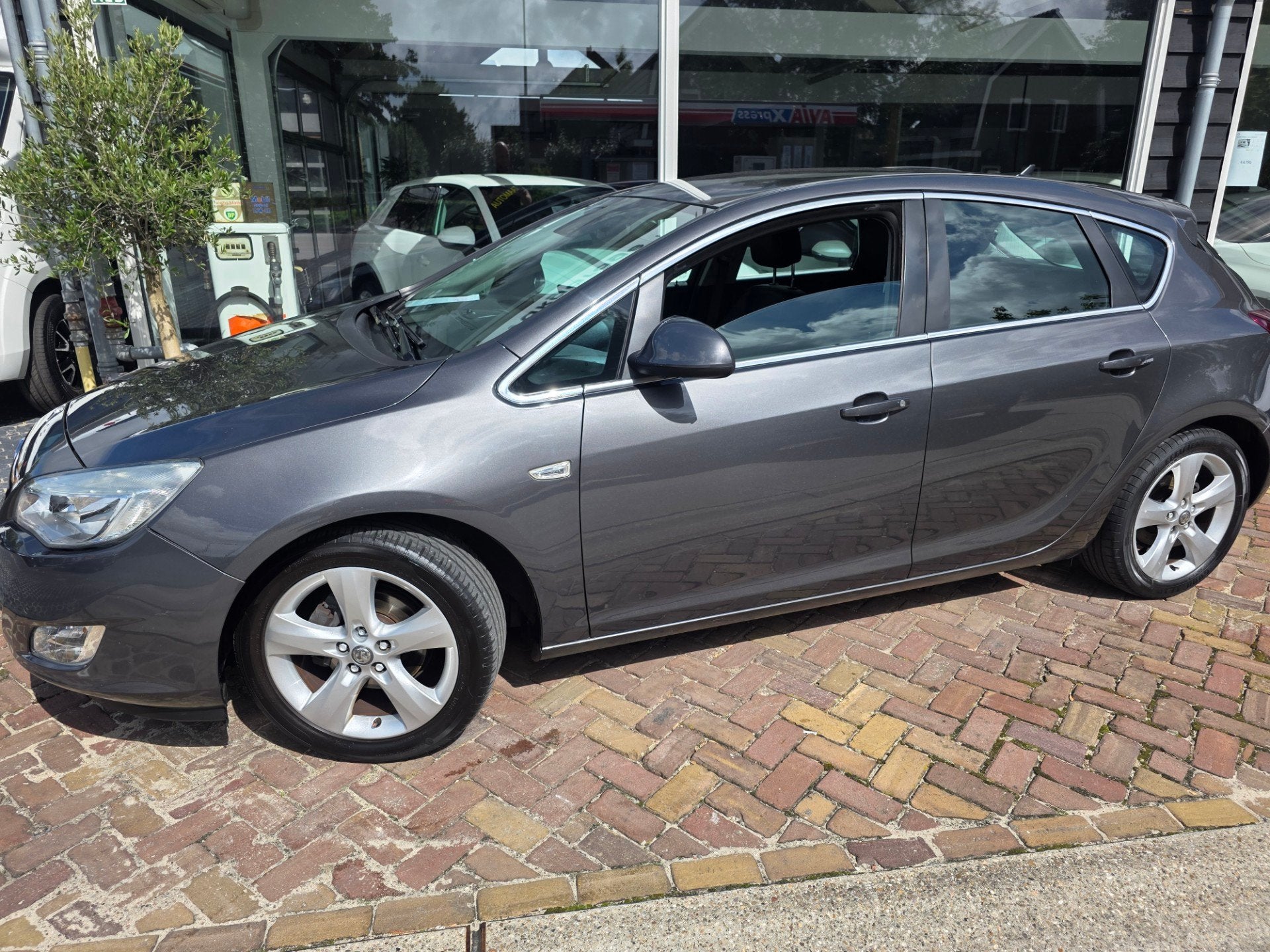 Opel Astra 1.4 Turbo Cosmo,goed onderhouden auto,trekhaak, Auto's, Opel, Voorwielaandrijving, Euro 5, 680 kg, 4 cilinders