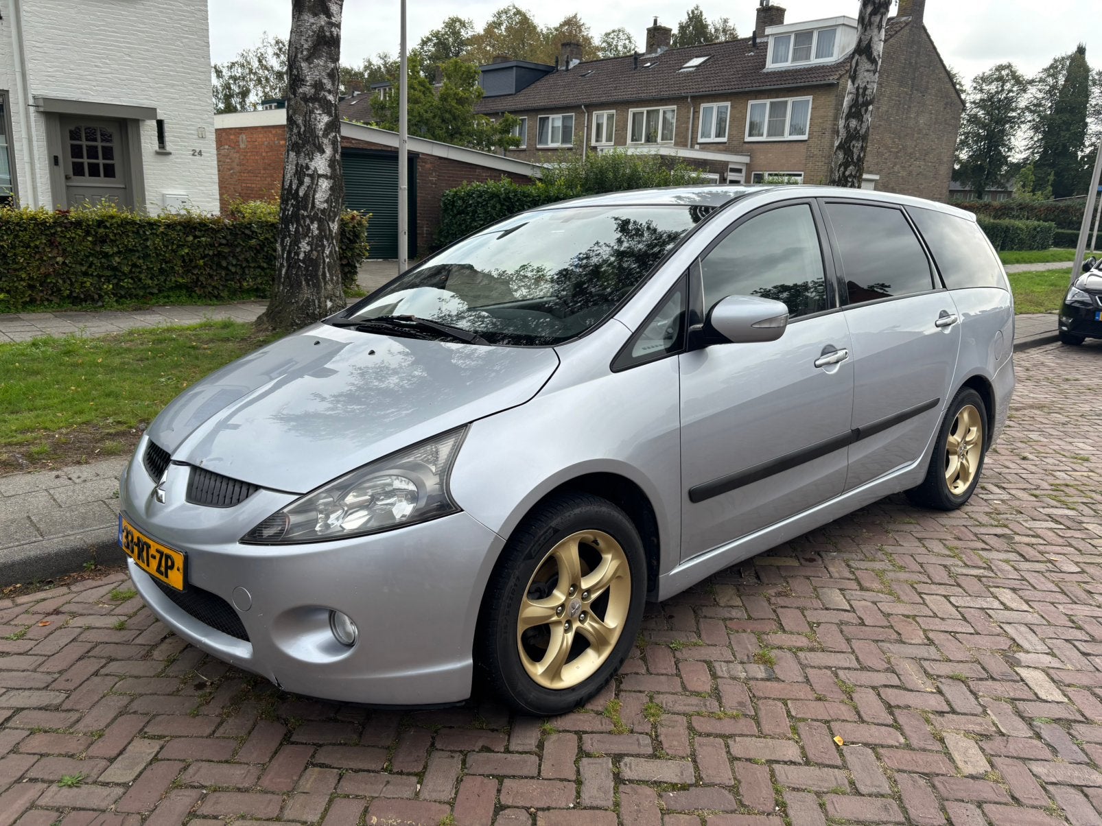 Mitsubishi Grandis 2.4 Mivec 7 2005 Grijs, Auto's, Voorwielaandrijving, Stof, 164 pk, 7 stoelen