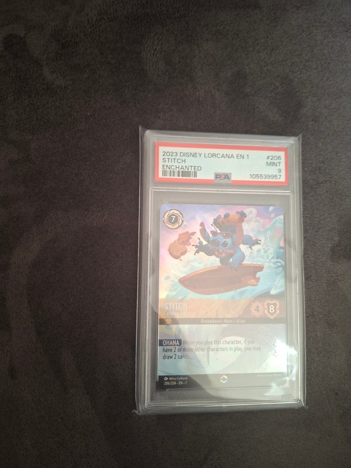 PSA 9 Disney Lorcana Stitch Enchanted 2023, Hobby en Vrije tijd, Ophalen of Verzenden, Zo goed als nieuw, Losse kaart, Foil