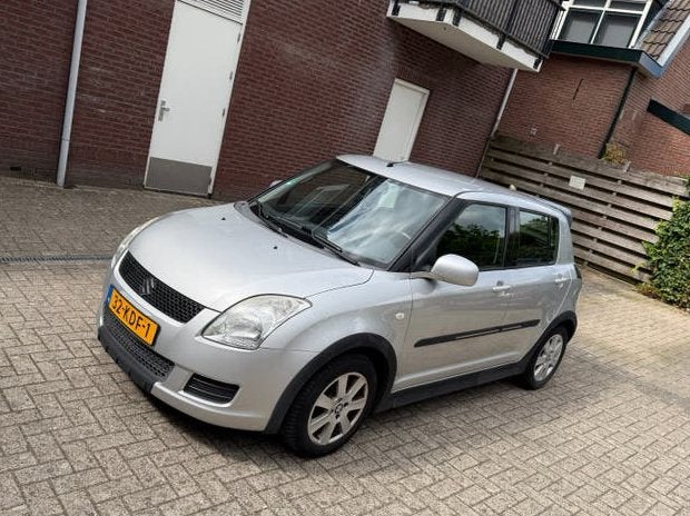 Suzuki Swift 1.3 5D 2009 Grijs, Auto's, Voorwielaandrijving, 40 €/maand, 400 kg, Swift
