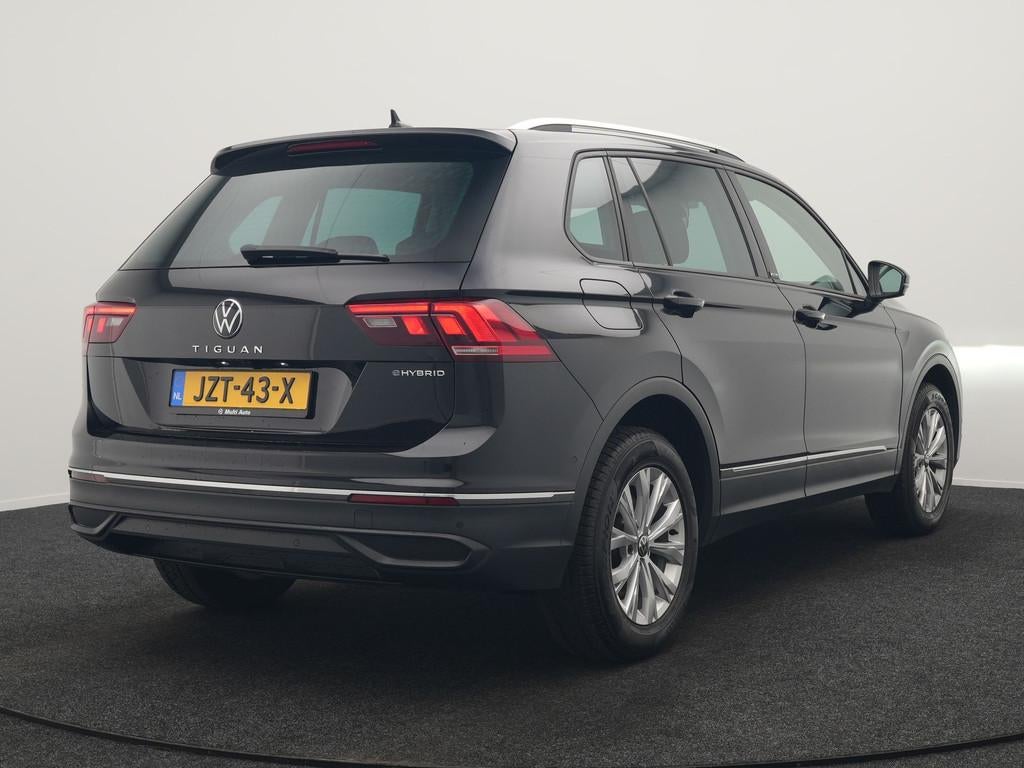 Volkswagen Tiguan 1.4 TSI eHybrid Active PHEV 245pk Dealer O, Auto's, 1716 kg, Stof, 4 cilinders, Zwart