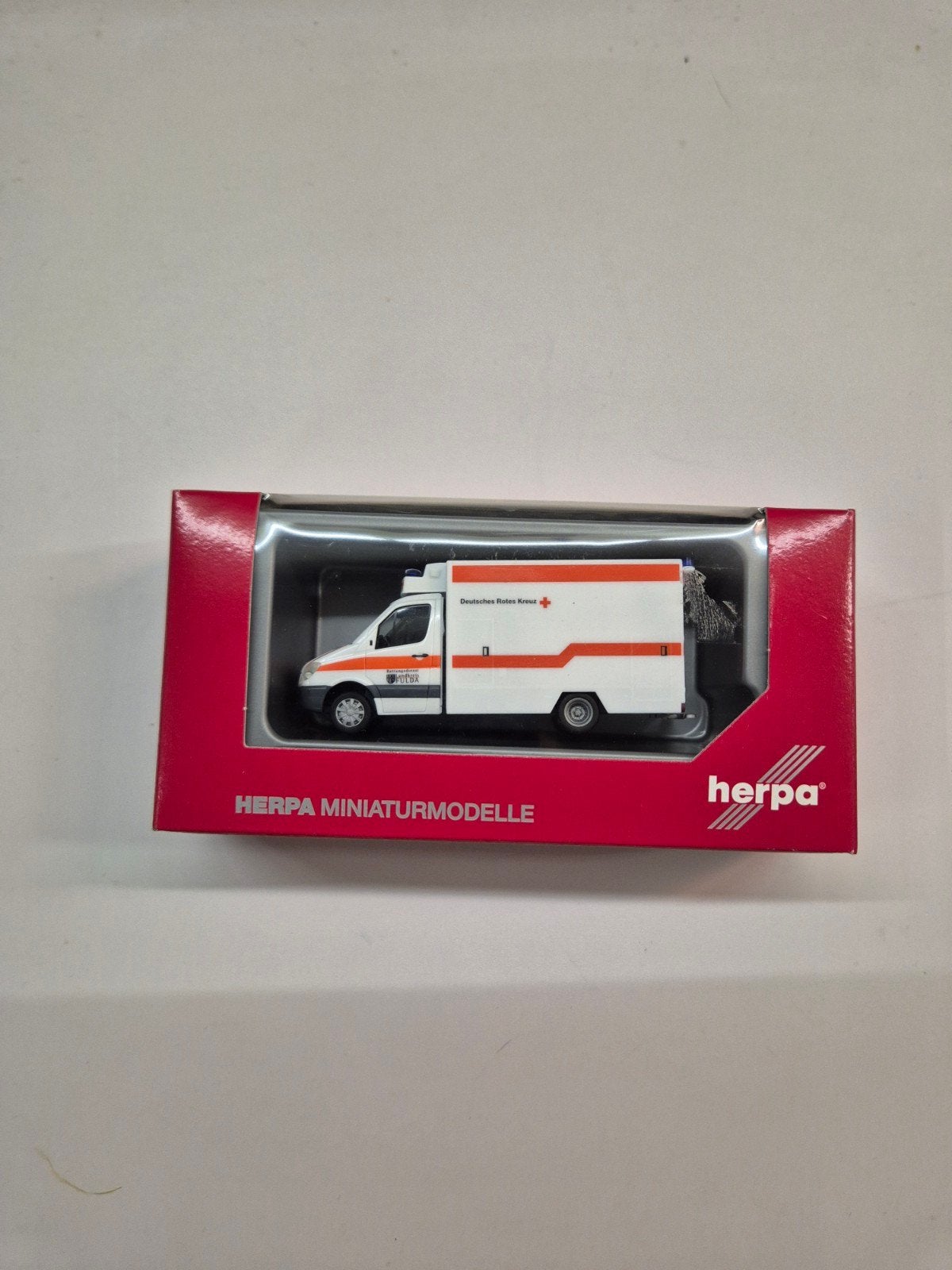Herpa Mercedes-Benz Sprinter Duitse rode kruis (DRK) 1:87, Hobby en Vrije tijd, Ophalen of Verzenden, Nieuw, Bus of Vrachtwagen