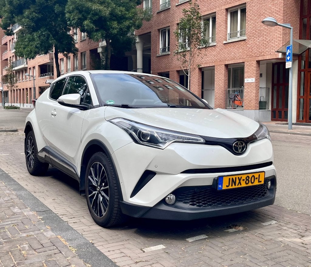 Toyota C-HR 1.2T EXECUTIVE 116pk AUTOMAAT CVT 2017, Euro 6, Leder en Stof, Wit, 1365 kg