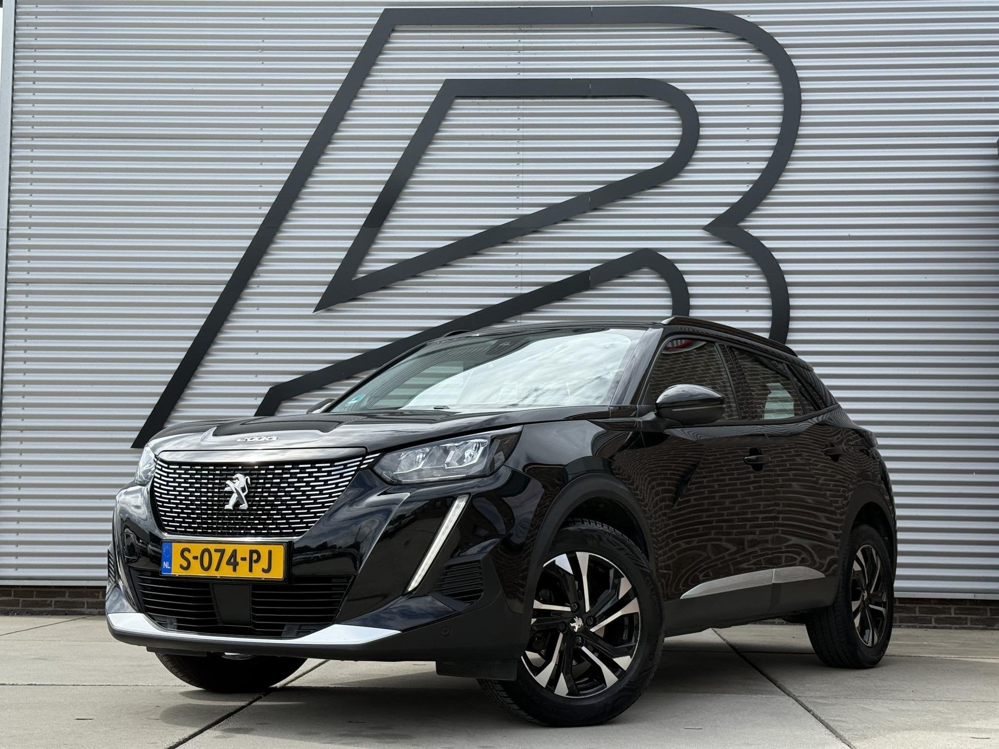 Peugeot 2008 1.2 PureTech Allure 1e Eigenaar|Navi|Camera|i-C, Auto's, Voorwielaandrijving, Stof, Gebruikt, Euro 6