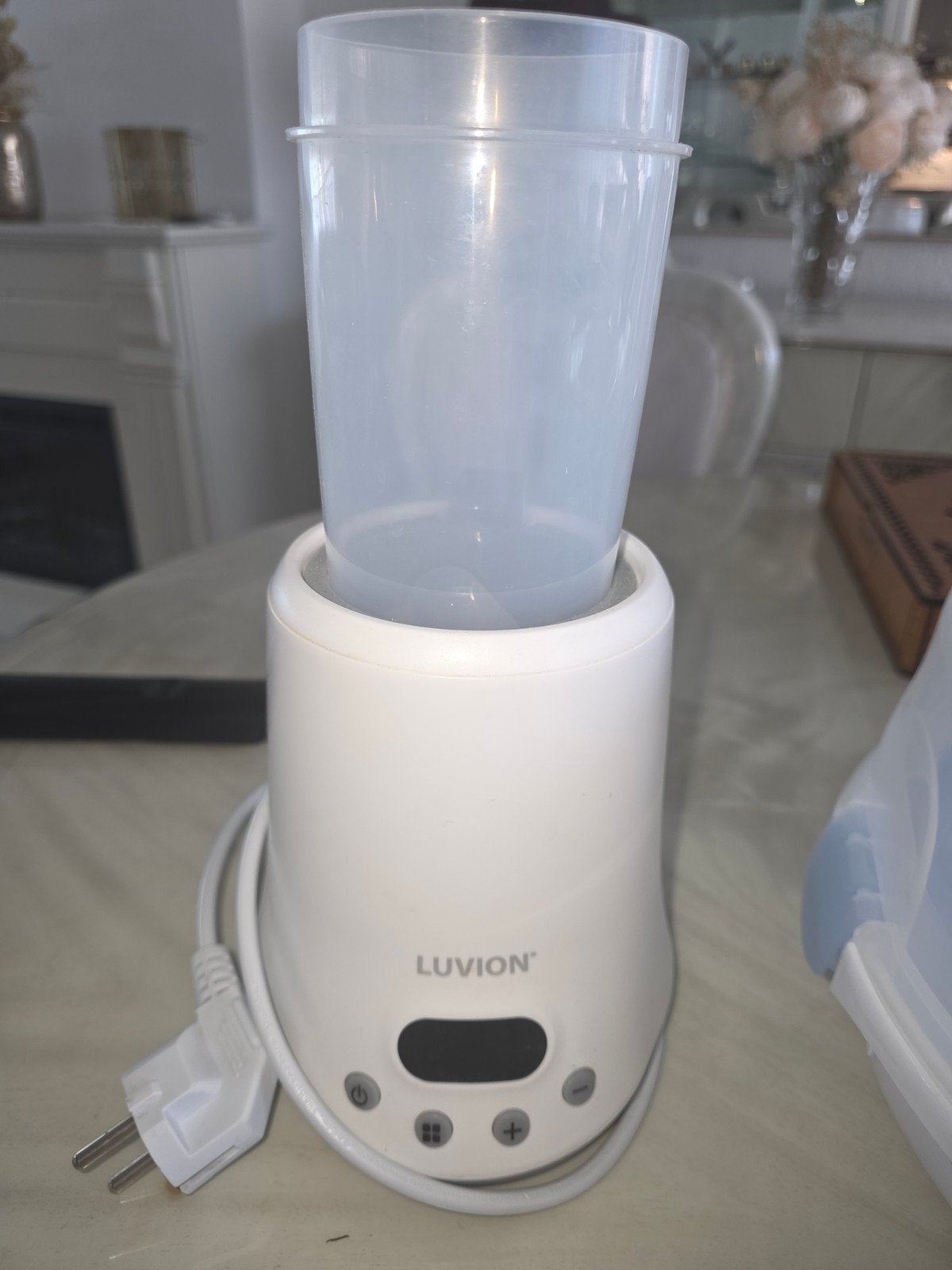 Luvion Flessenwarmer - Snel en Veilig, Ophalen of Verzenden, Zo goed als nieuw, Flessen- of potjesverwarmer