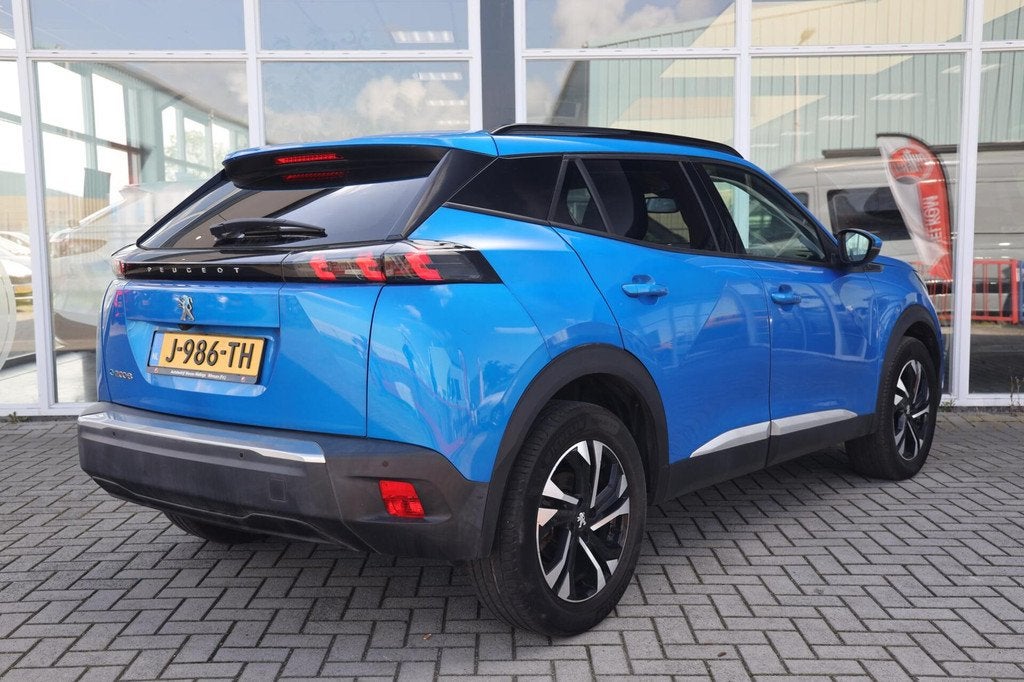 Peugeot e-2008 EV Allure 50 kWh|SOH 91%|Camera|ACC|Navi|Carp, Auto's, Peugeot, 330 km, 136 pk, Gebruikt, Blauw