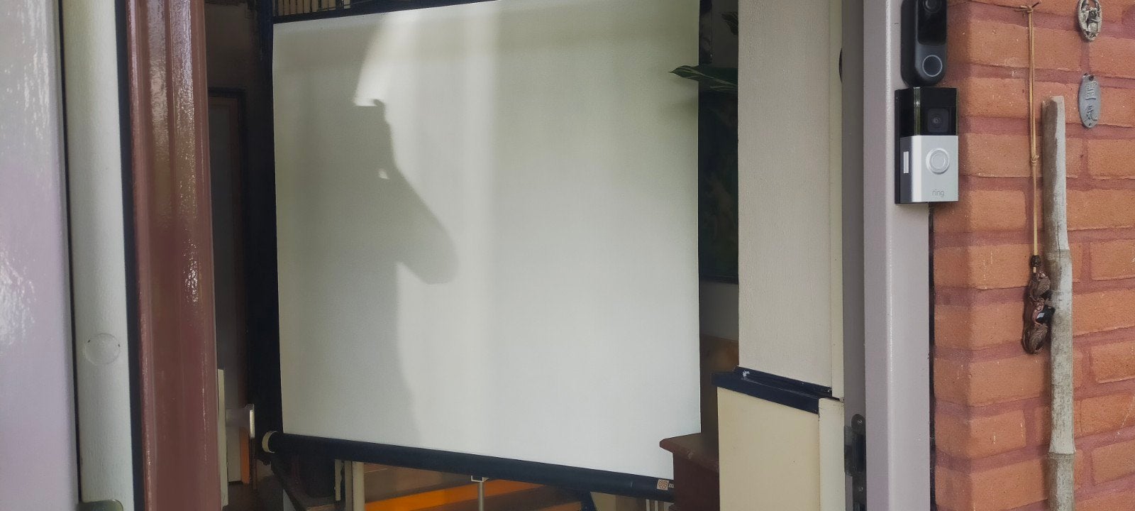 Projectiescherm op statief, Ophalen
