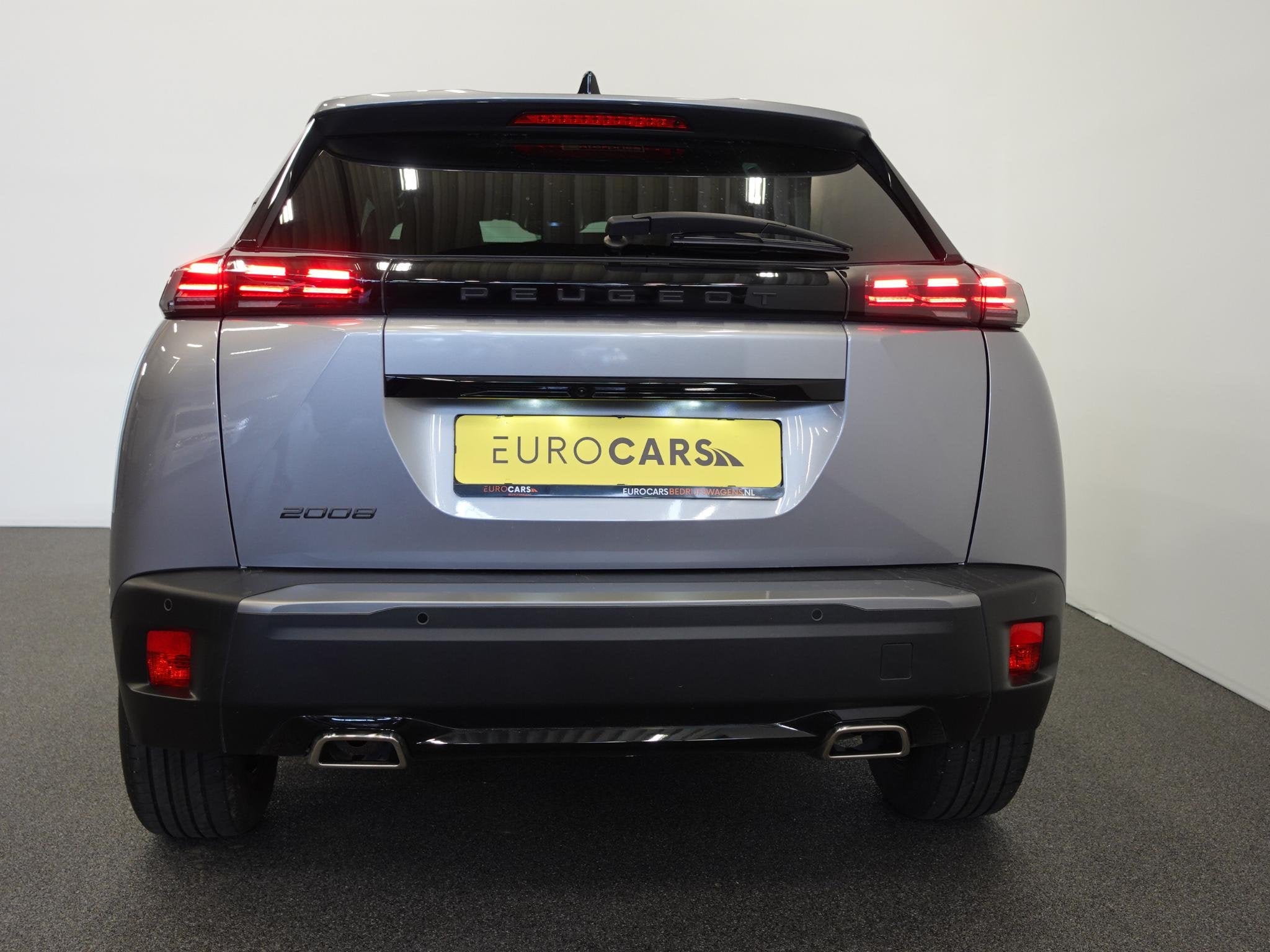 Peugeot 2008 1.2 PureTech 130pk Automaat Allure Navigatie Ap, Auto's, Gebruikt, Zwart, 1199 cc, Leder en Stof