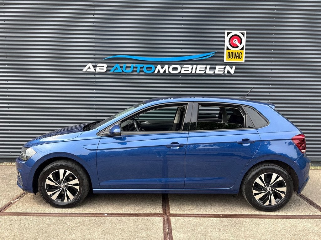 Volkswagen Polo 1.0 TSI Comfortline AUTOMAAT/ CARPLAY/ PARKE, Gebruikt, 95 pk, Met garantie (alle), Blauw