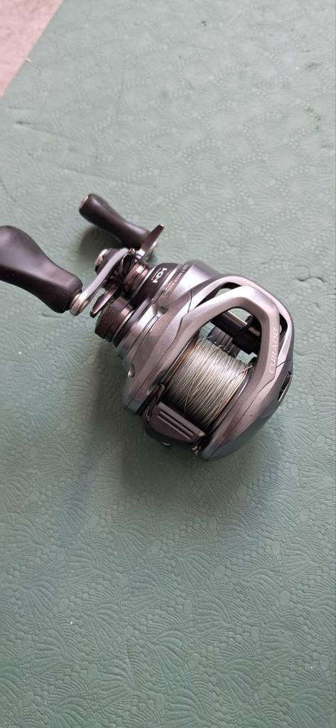Shimano Curado 71XG Baitcaster reel, Ophalen of Verzenden, Zo goed als nieuw, Molen