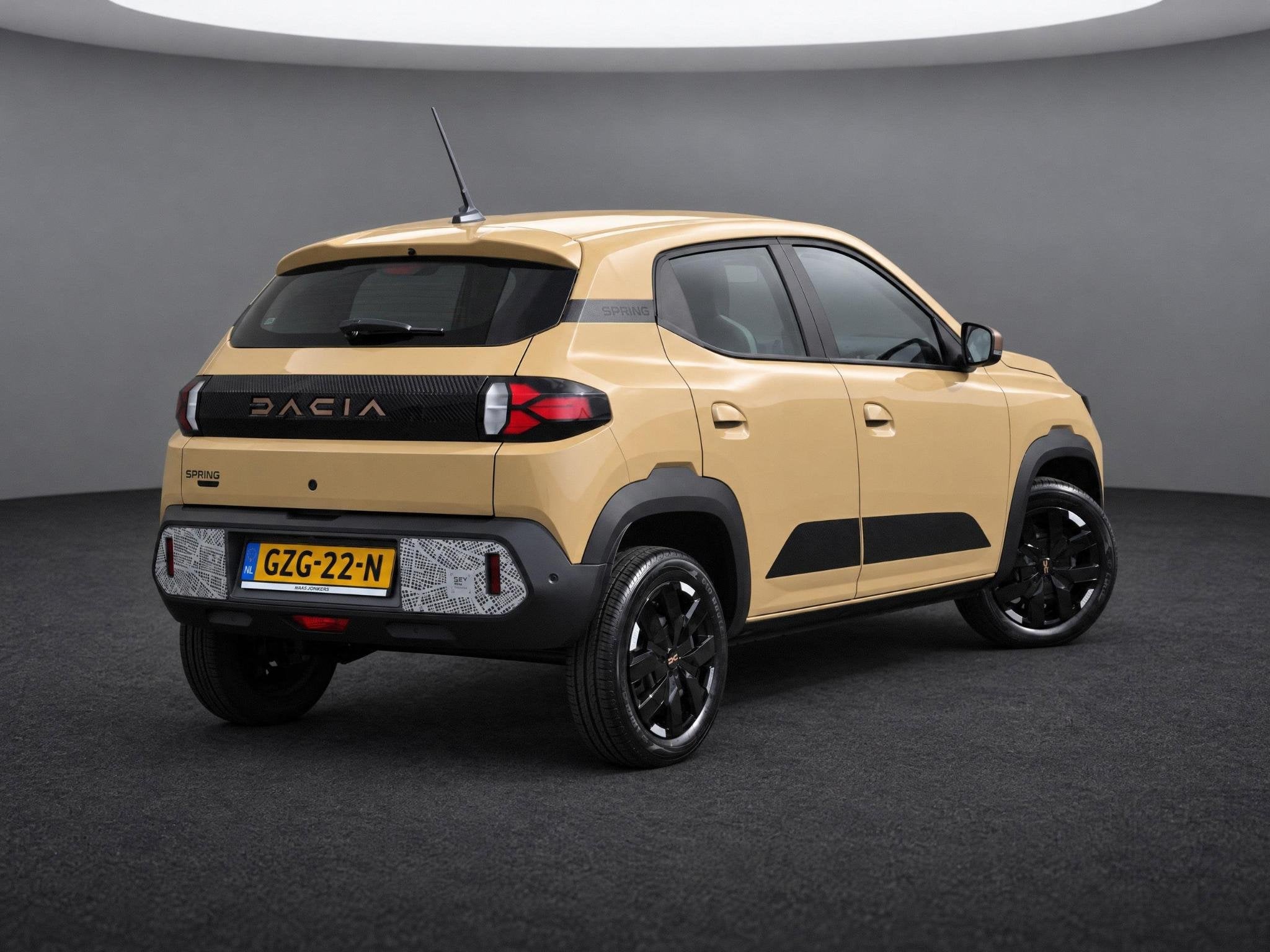 Dacia Spring Extreme 65 26.8 kWh | DC-LADER | CAMERA | NAVI, Auto's, Dealer onderhouden, Gebruikt, Bruin, 4 stoelen