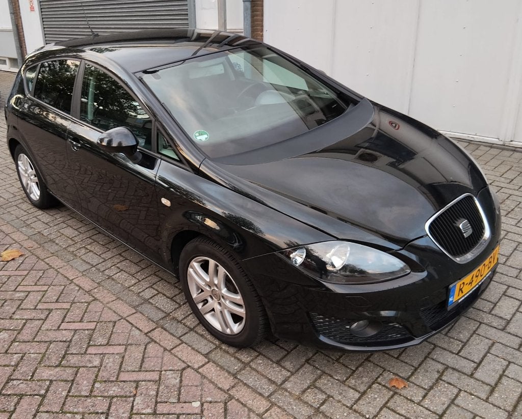 Seat Leon 1.2 TSI 77KW 2011 Zwart, Auto's, Voorwielaandrijving, Euro 5, Stof, Zwart
