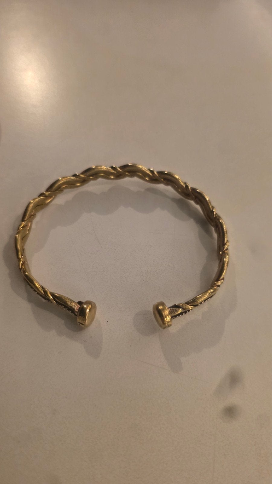 Koperen armband met gevlochten design, Ophalen of Verzenden, Gebruikt, Overige kleuren, Overige materialen