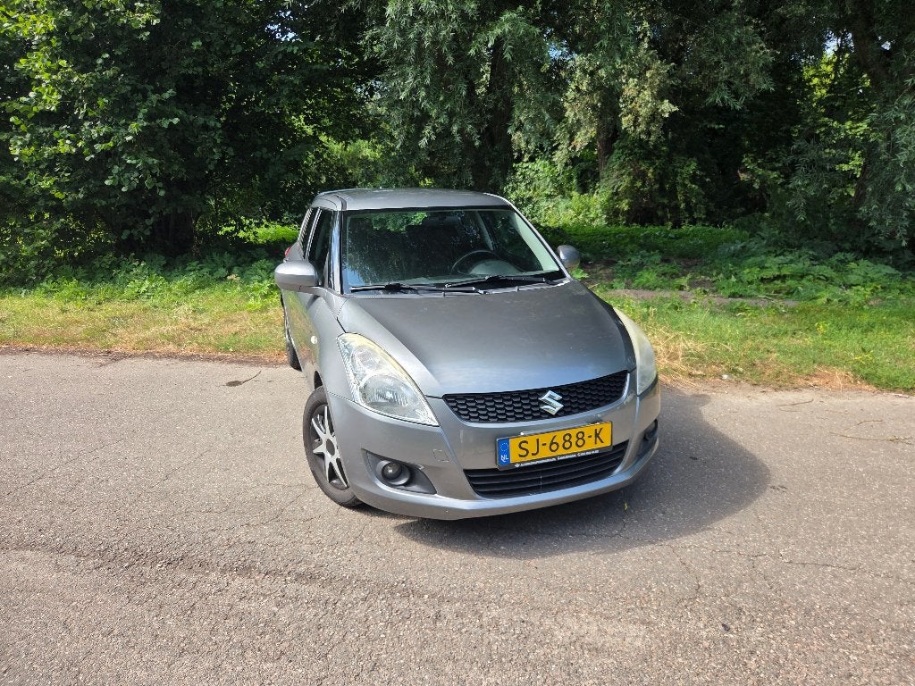 Nette Suzuki Swift 1.2 5-D 2012 Grijs, Auto's, Voorwielaandrijving, Stof, 4 cilinders, 400 kg