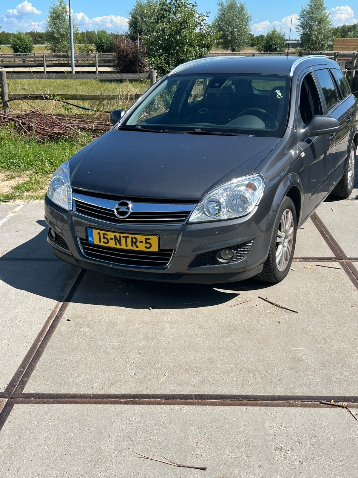 Opel Astra 1.6 16V 85KW St.wgn. 2010 Grijs super nette auto, Auto's, Opel, Particulier, Astra, Benzine, C, Stationwagon, Handgeschakeld