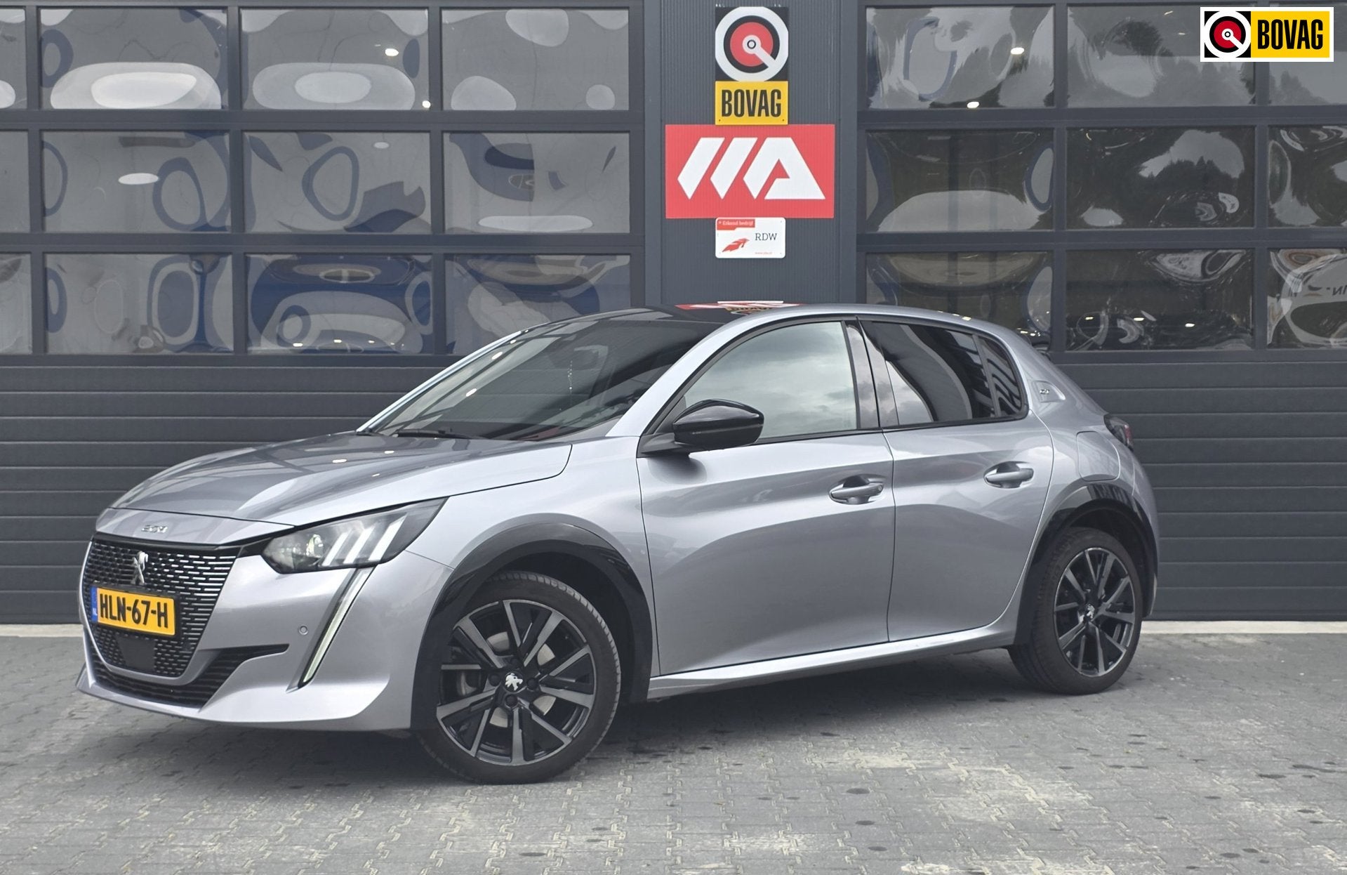 Peugeot 208 1.2 PureTech GT | ADAPTIVE | CAMERA | CARPLAY, Auto's, Gebruikt, 1199 cc, 1133 kg, Leder en Stof