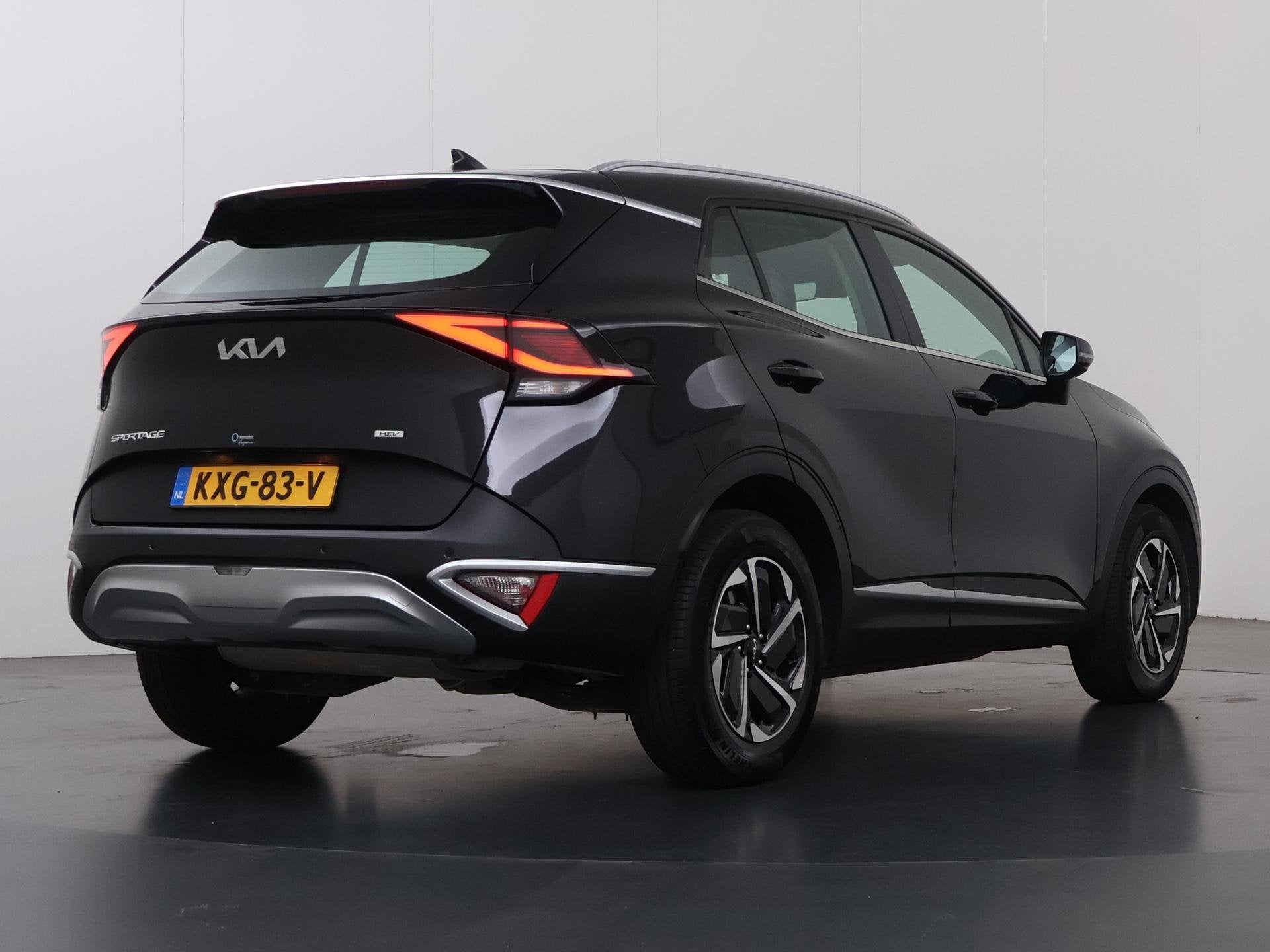 Kia Sportage 1.6 T-GDi Hybrid DynamicLine | Navigatie | Park, Auto's, Stof, Gebruikt, 4 cilinders, 1360 kg
