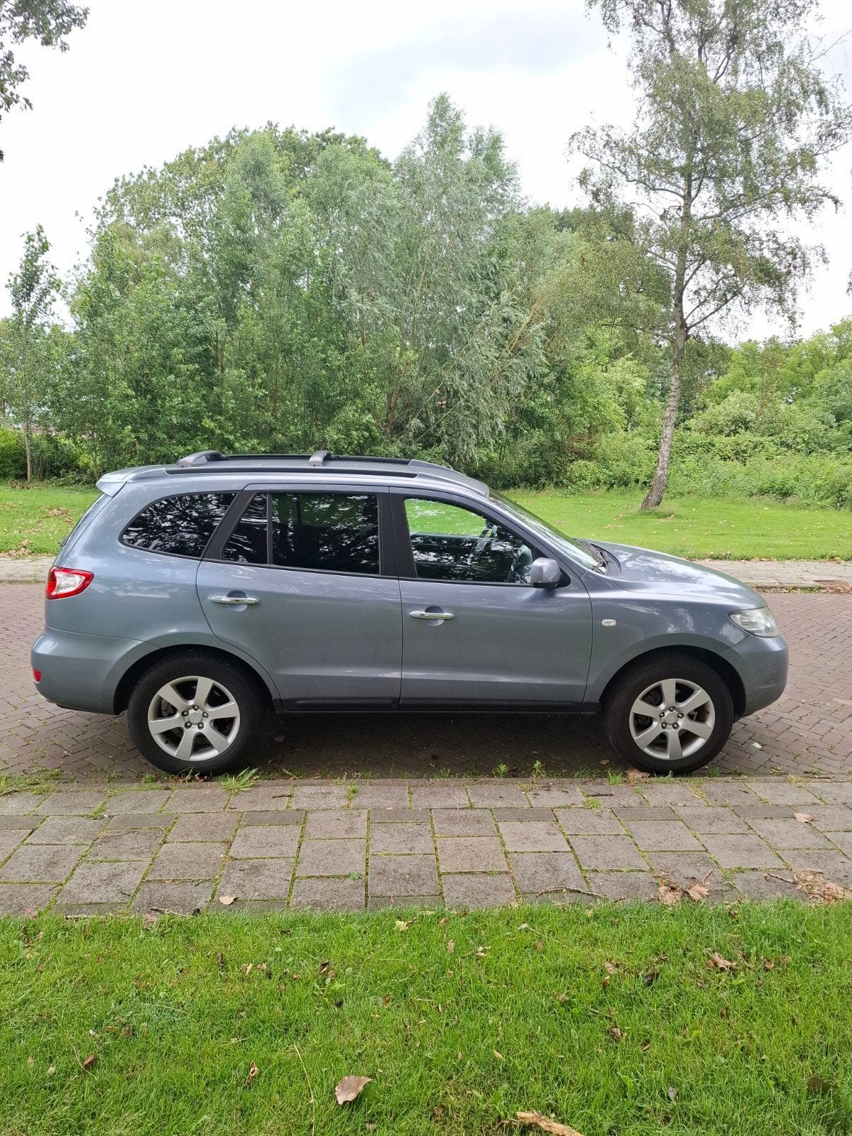 Hyundai Santa Fe 2.7 2WD Lange Apk Nw Distributieriem, Auto's, Hyundai, Voorwielaandrijving, Santa Fe, Zwart, 2000 kg