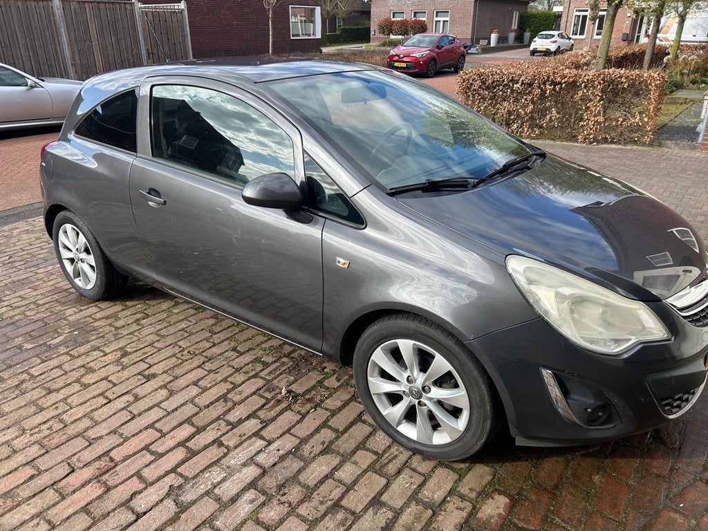 Opel Corsa 1.2 16V LPG 3D 2012 Grijs, Auto's, Opel, Voorwielaandrijving, 83 pk, 4 cilinders, 1229 cc