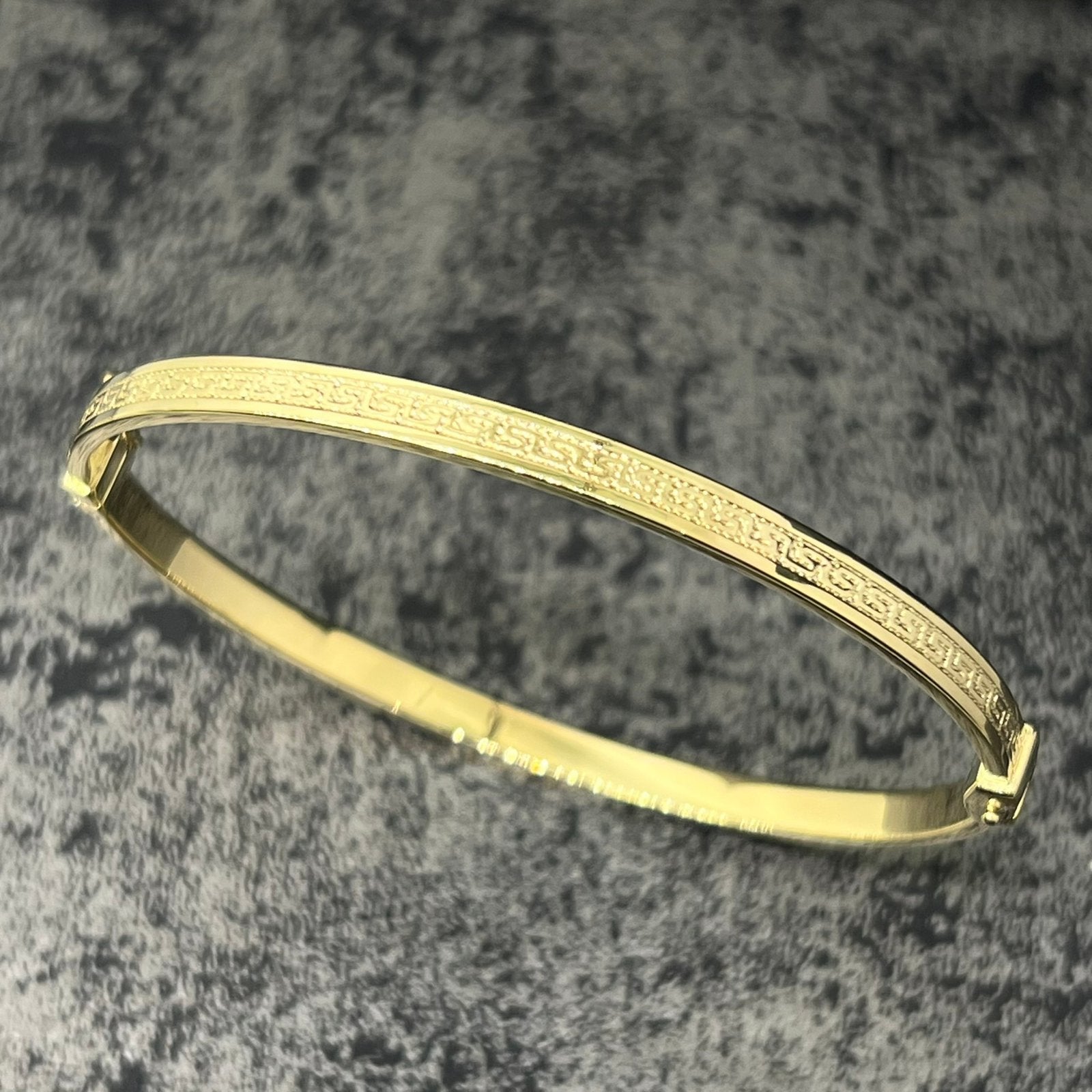 14 karaats gouden armband versace schakel, Ophalen of Verzenden, Zo goed als nieuw, Goud