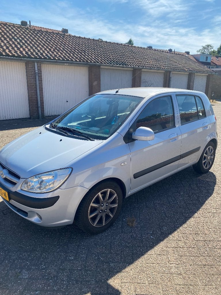 Hyundai Getz 1.4 Benzine 2009 – 160.000 km NAP – Airco –, Voorwielaandrijving, Stof, 40 €/maand, Zwart