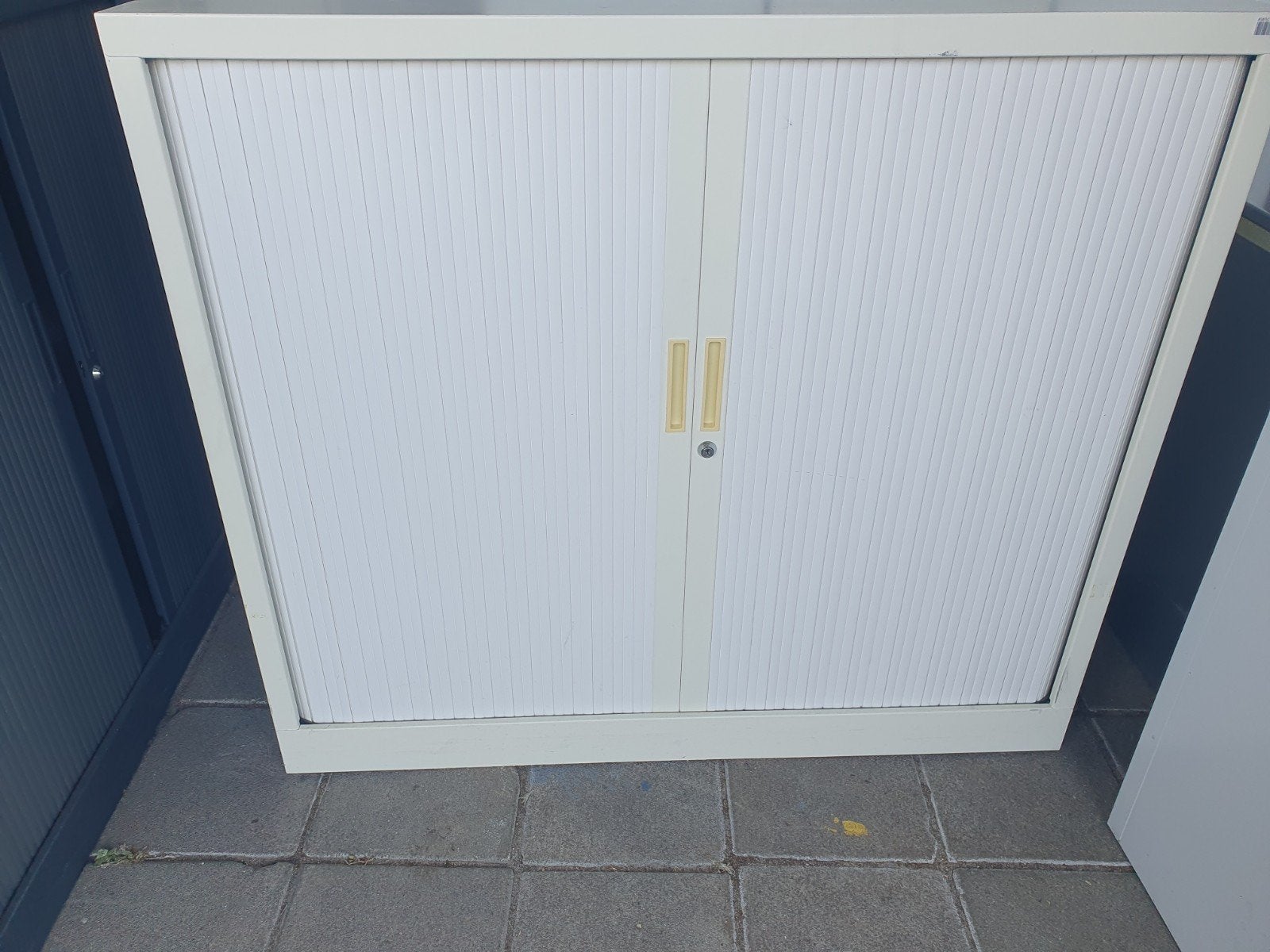 Halfhoge roldeurkast 120x105x43 cm, Ophalen