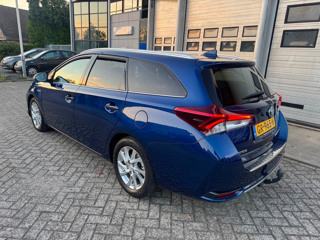 Toyota Auris Touring Sports 1.8 Hybrid Lease pro Panodak,Cam, Auto's, Gebruikt, Blauw, Leder en Stof, Origineel Nederlands