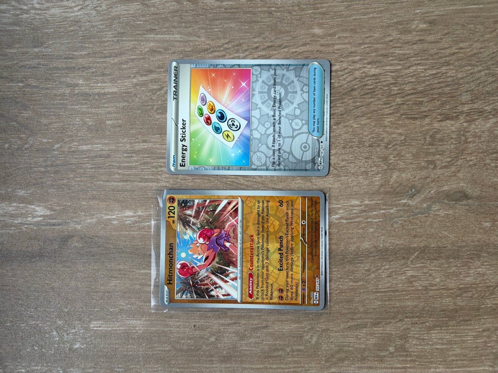 Pokémon 151 Hitmonchan en Energy Sticker reverse holo, Ophalen of Verzenden, Zo goed als nieuw, Losse kaart