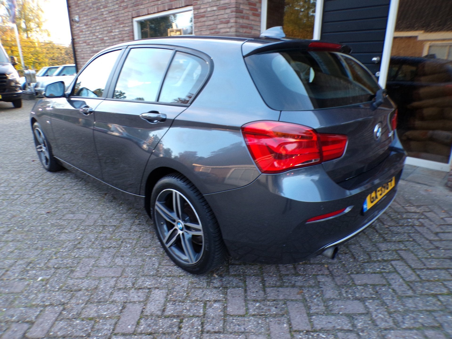 BMW 1-serie 118i EDE Corporate Automaat / Leder / Navi, Auto's, Dealer onderhouden, Gebruikt, Bedrijf, 650 kg
